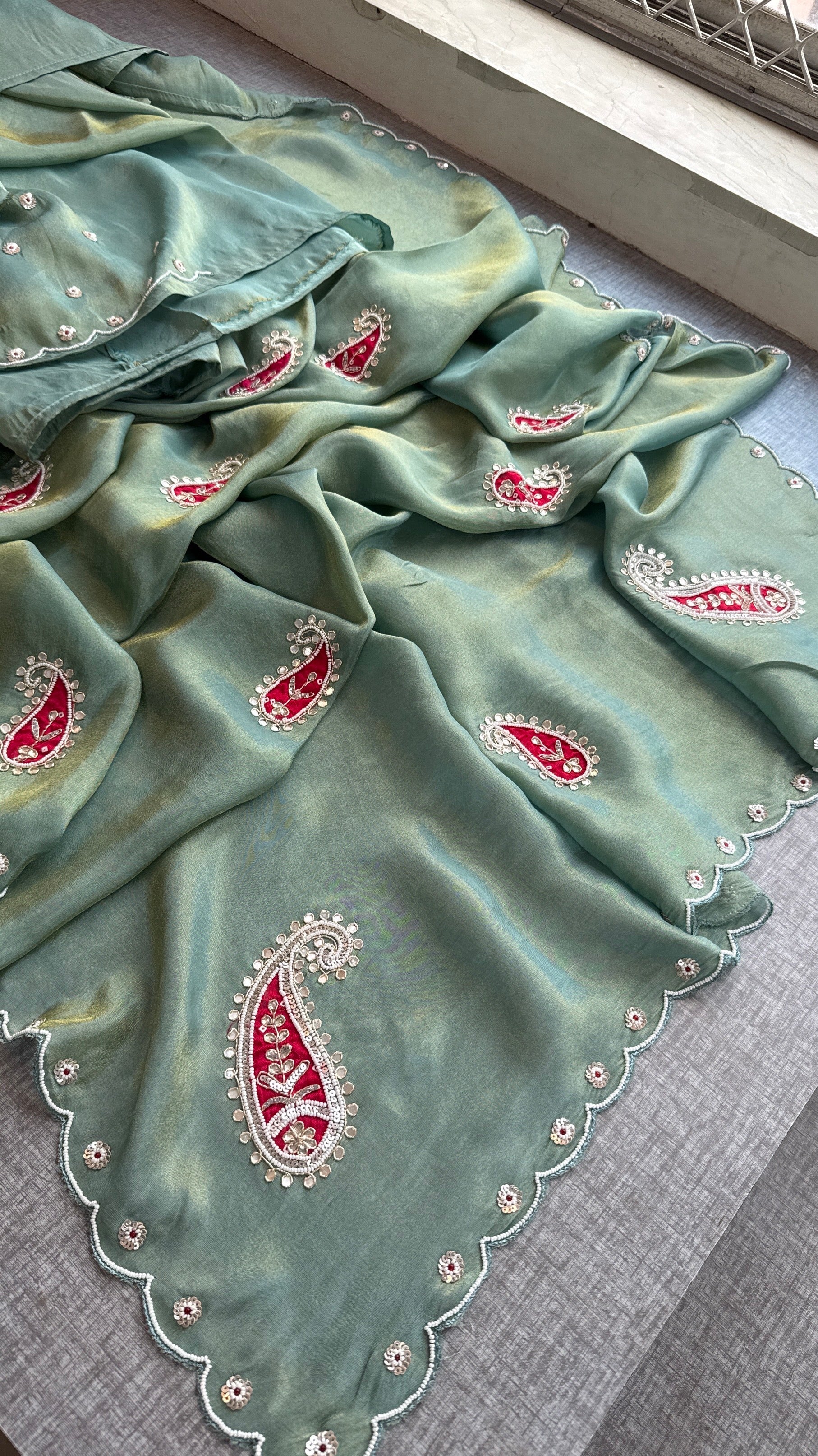Sage Green Cosmo Silk Saree with Scalloped Border and Red Paisley Motifs