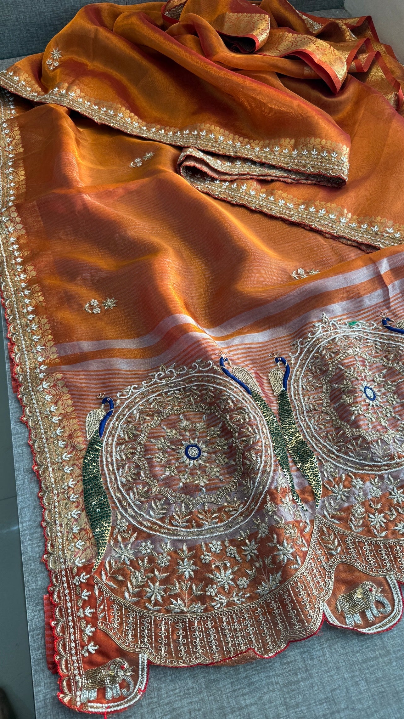 Tissue silk Saree with peacock handwork