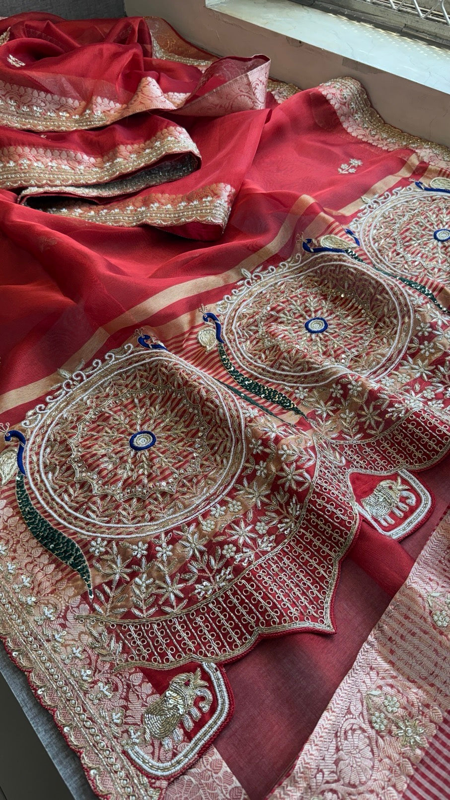 Tissue silk Saree with peacock handwork