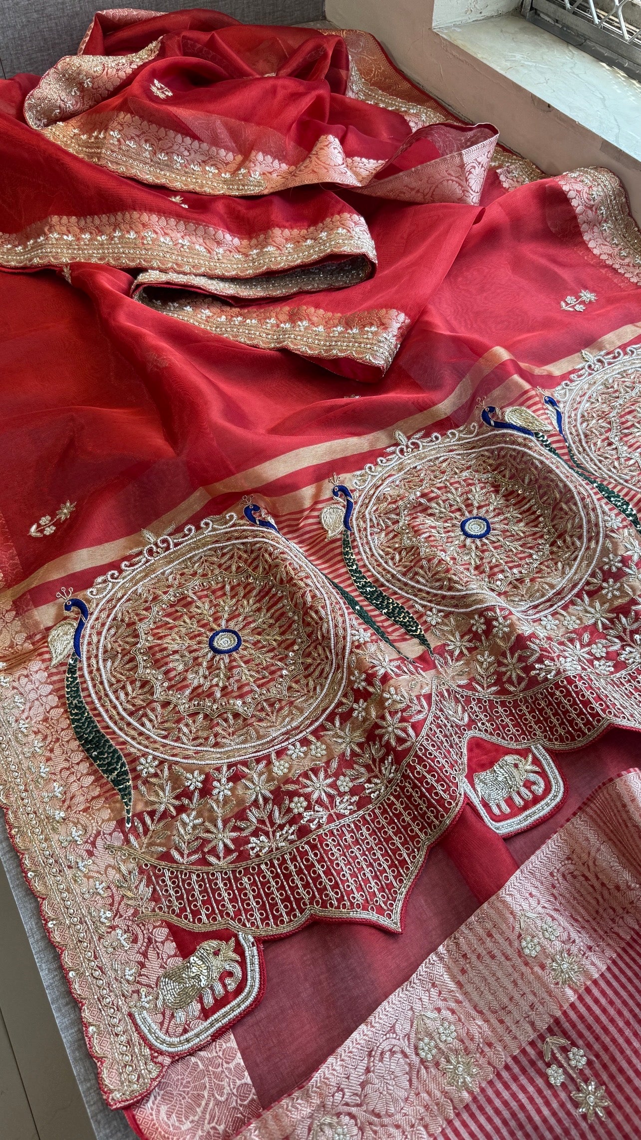 Tissue silk Saree with peacock handwork
