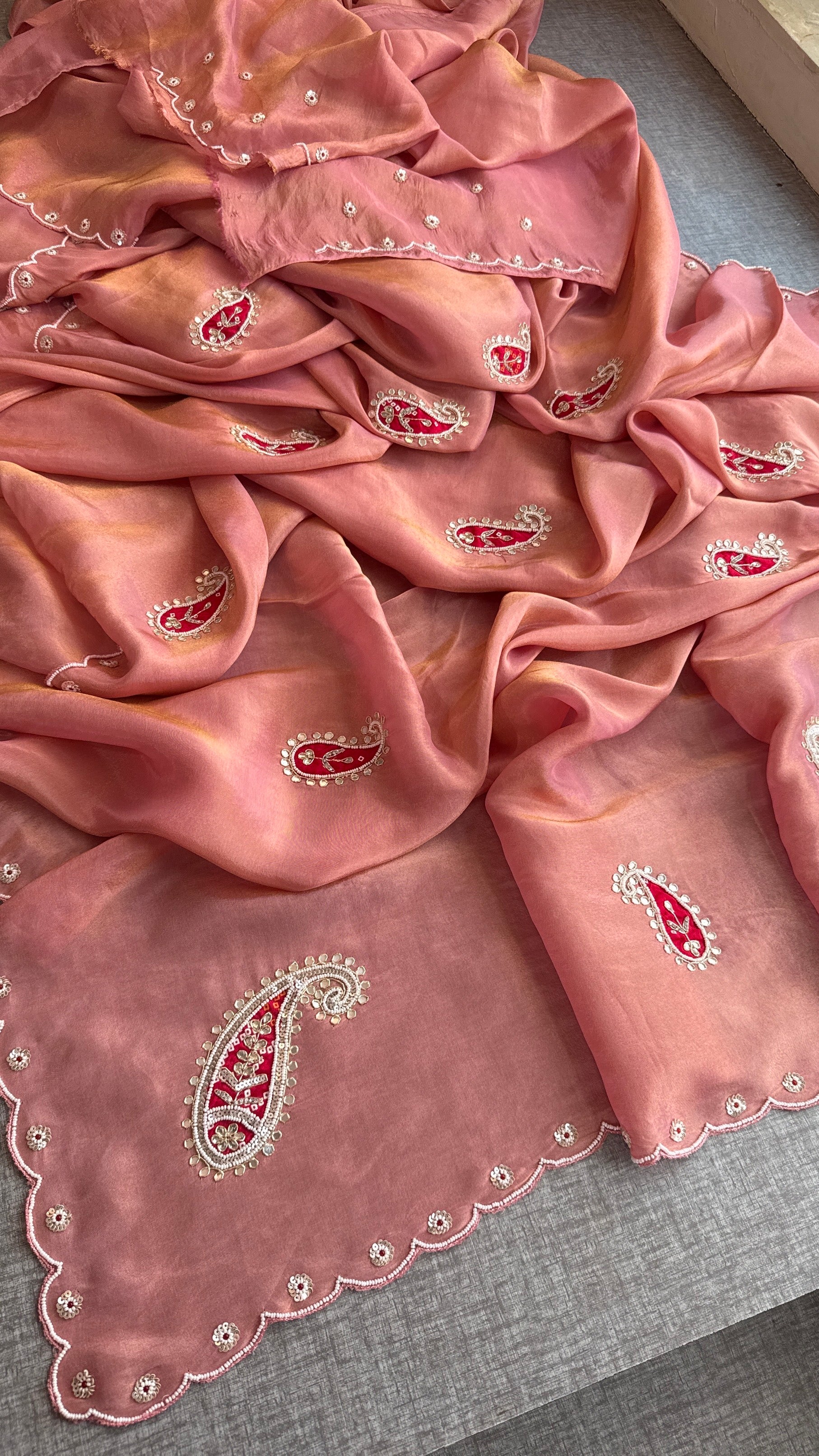 Peach-Pink Cosmo Silk Saree with Scalloped Border and Red Paisley Motifs