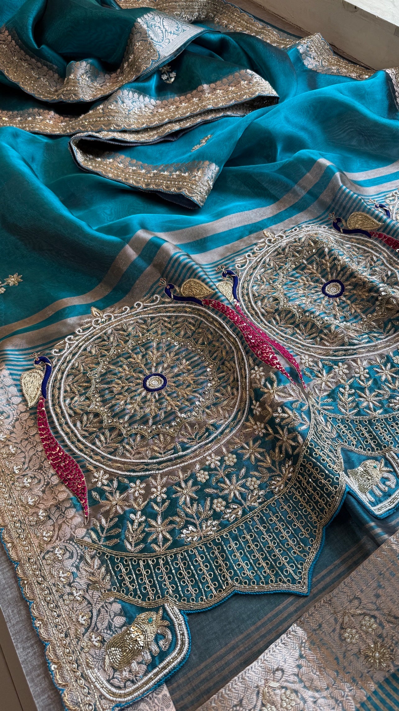 Tissue silk Saree with peacock handwork