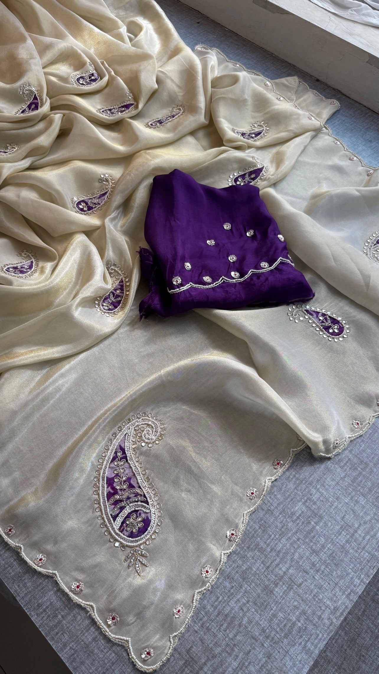 Pure Cosmo Tissue Silk Saree | Ivory & Purple Paisley Aari Work Saree | Sequin & Moti Embroidery | Scalloped Border