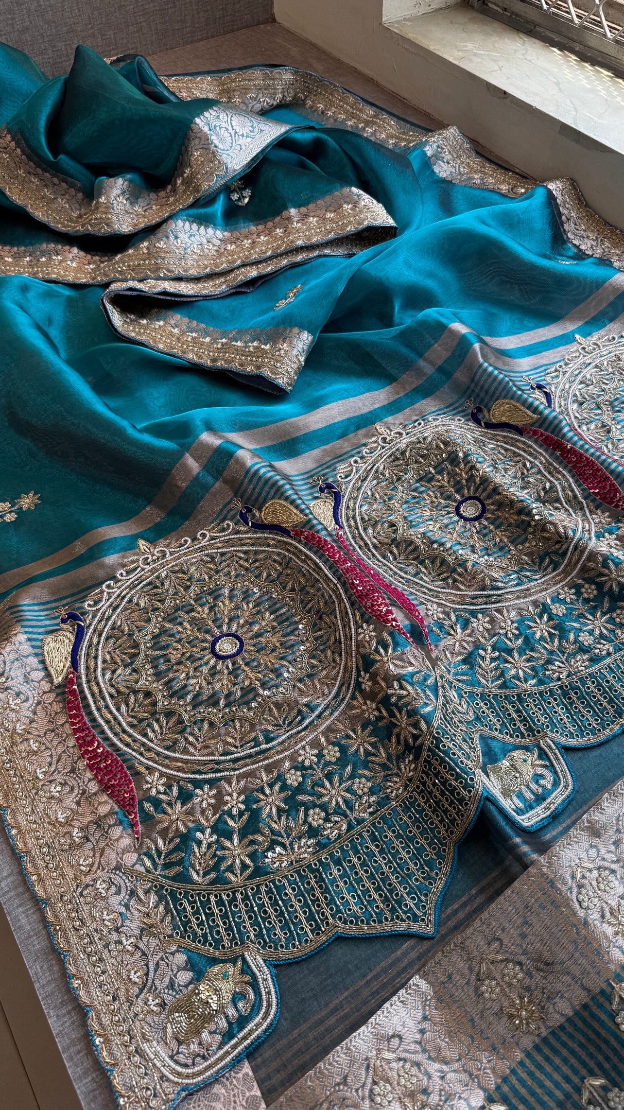 Tissue silk Saree with peacock handwork
