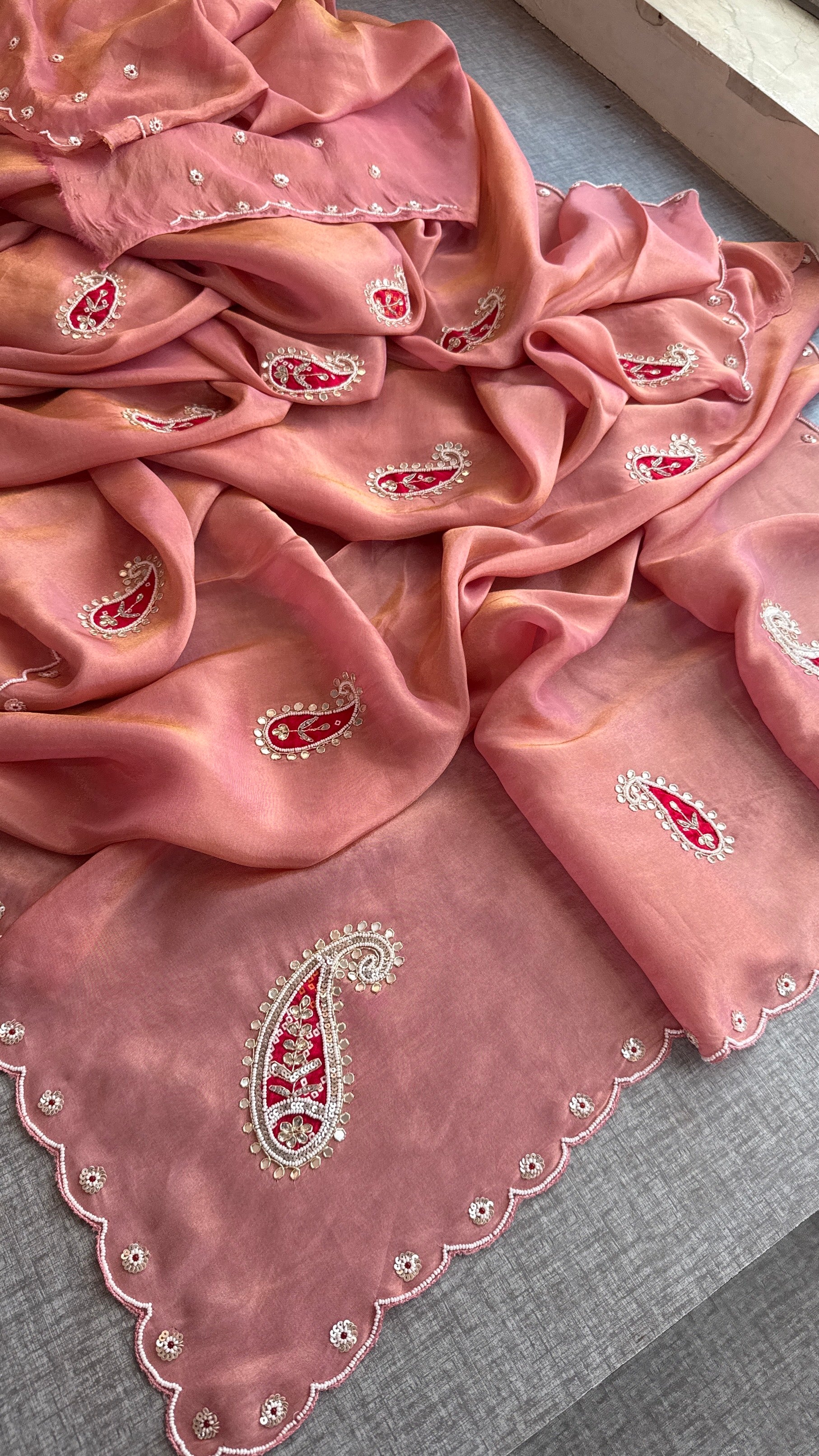 Peach-Pink Cosmo Silk Saree with Scalloped Border and Red Paisley Motifs