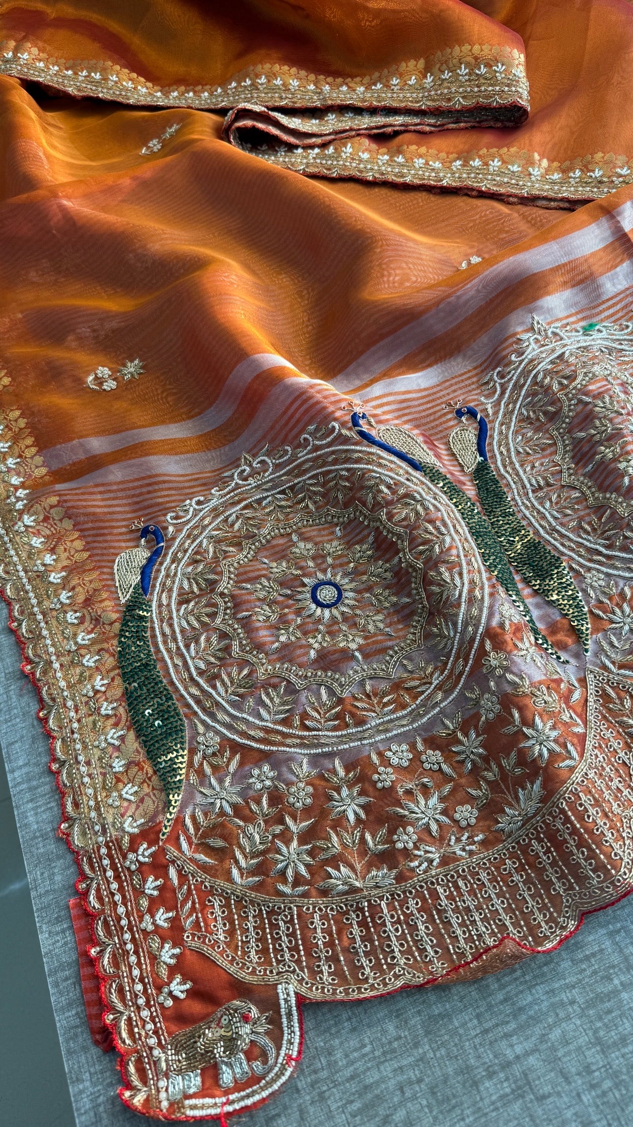 Tissue silk Saree with peacock handwork