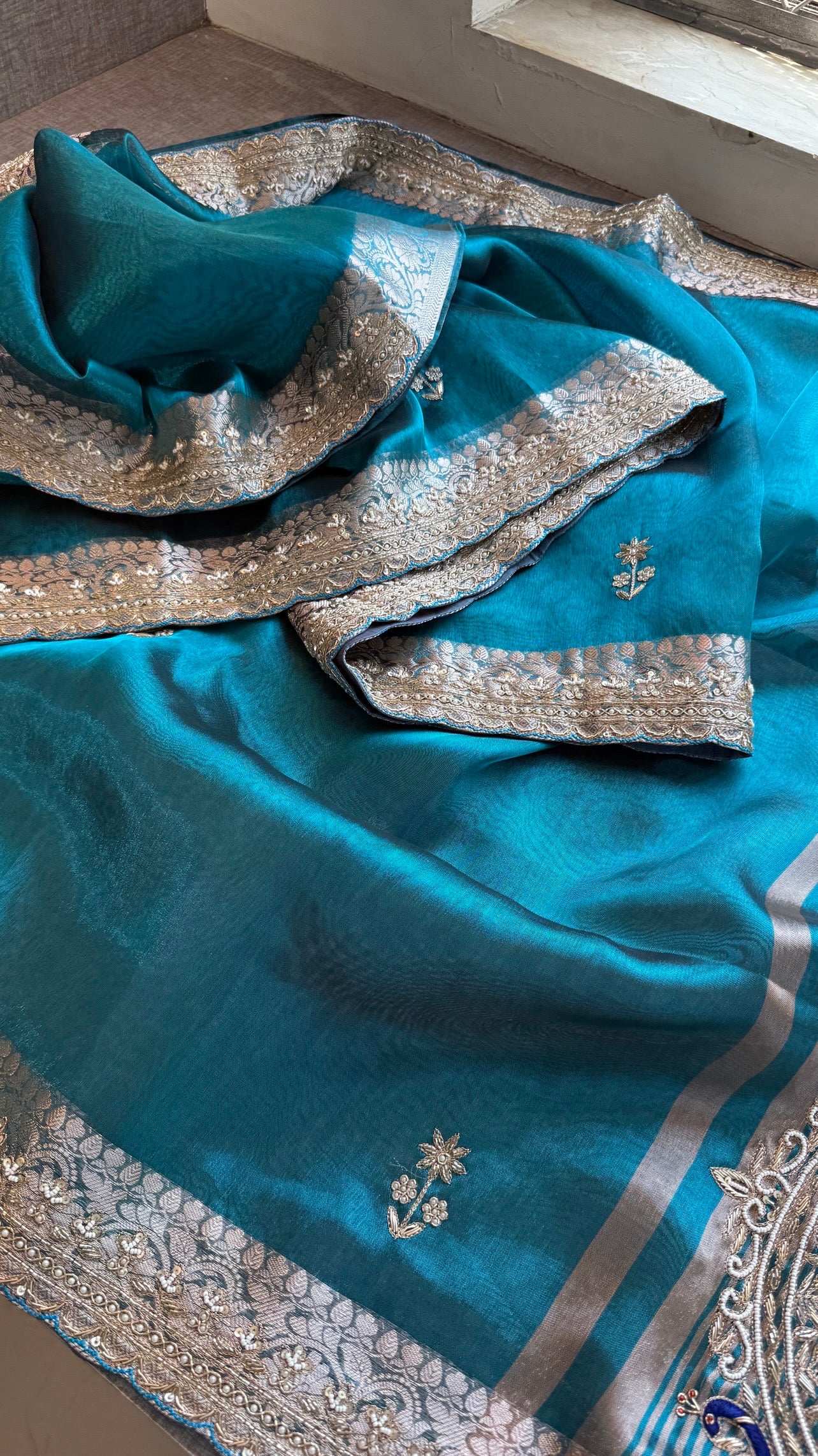 Tissue silk Saree with peacock handwork