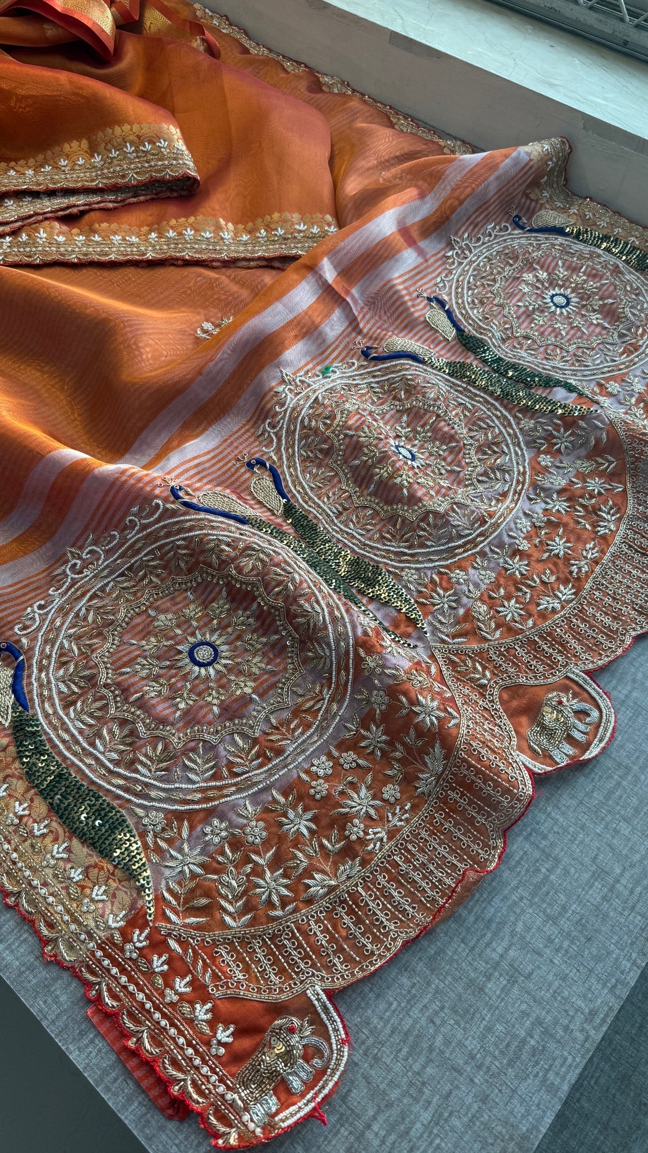Tissue silk Saree with peacock handwork