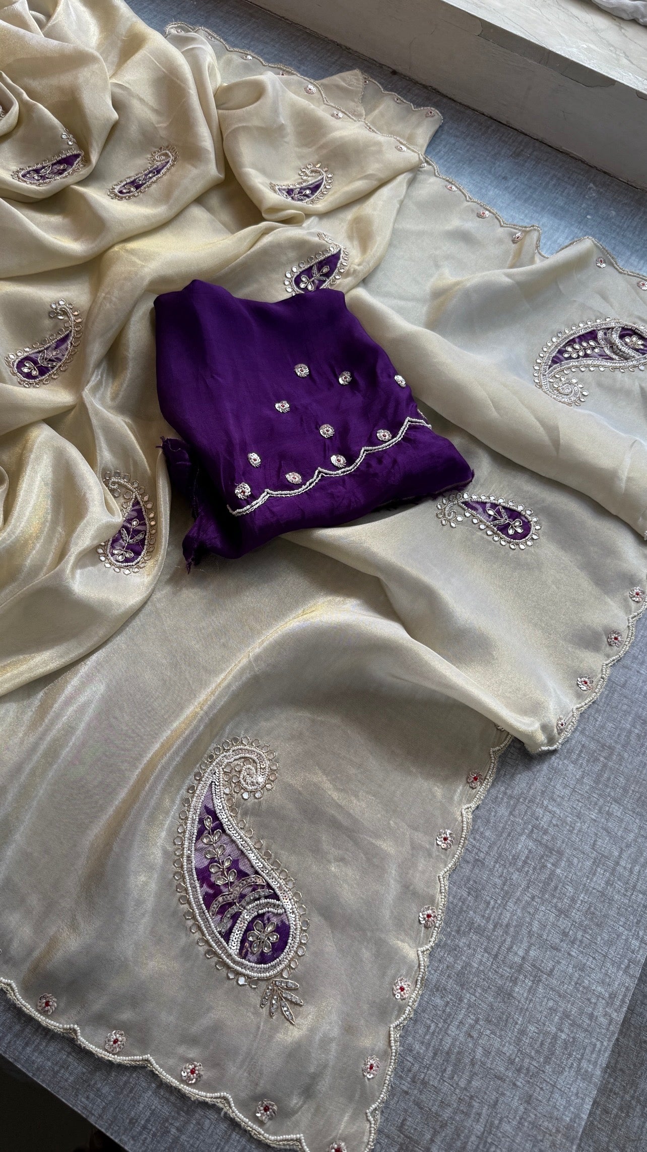 Pure Cosmo Tissue Silk Saree | Ivory & Purple Paisley Aari Work Saree | Sequin & Moti Embroidery | Scalloped Border