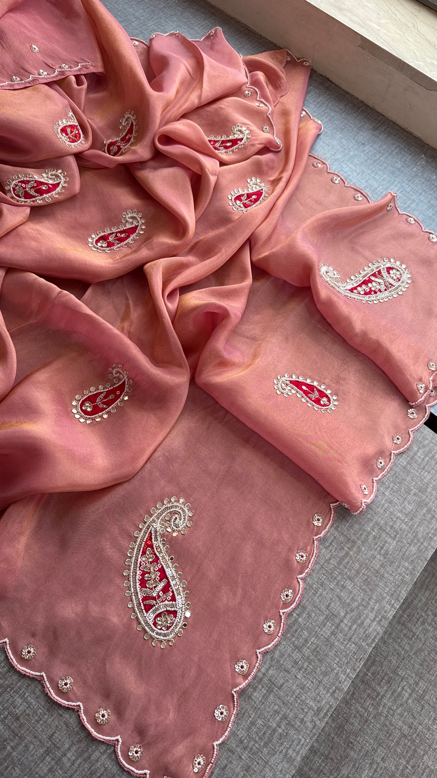 Peach-Pink Cosmo Silk Saree with Scalloped Border and Red Paisley Motifs
