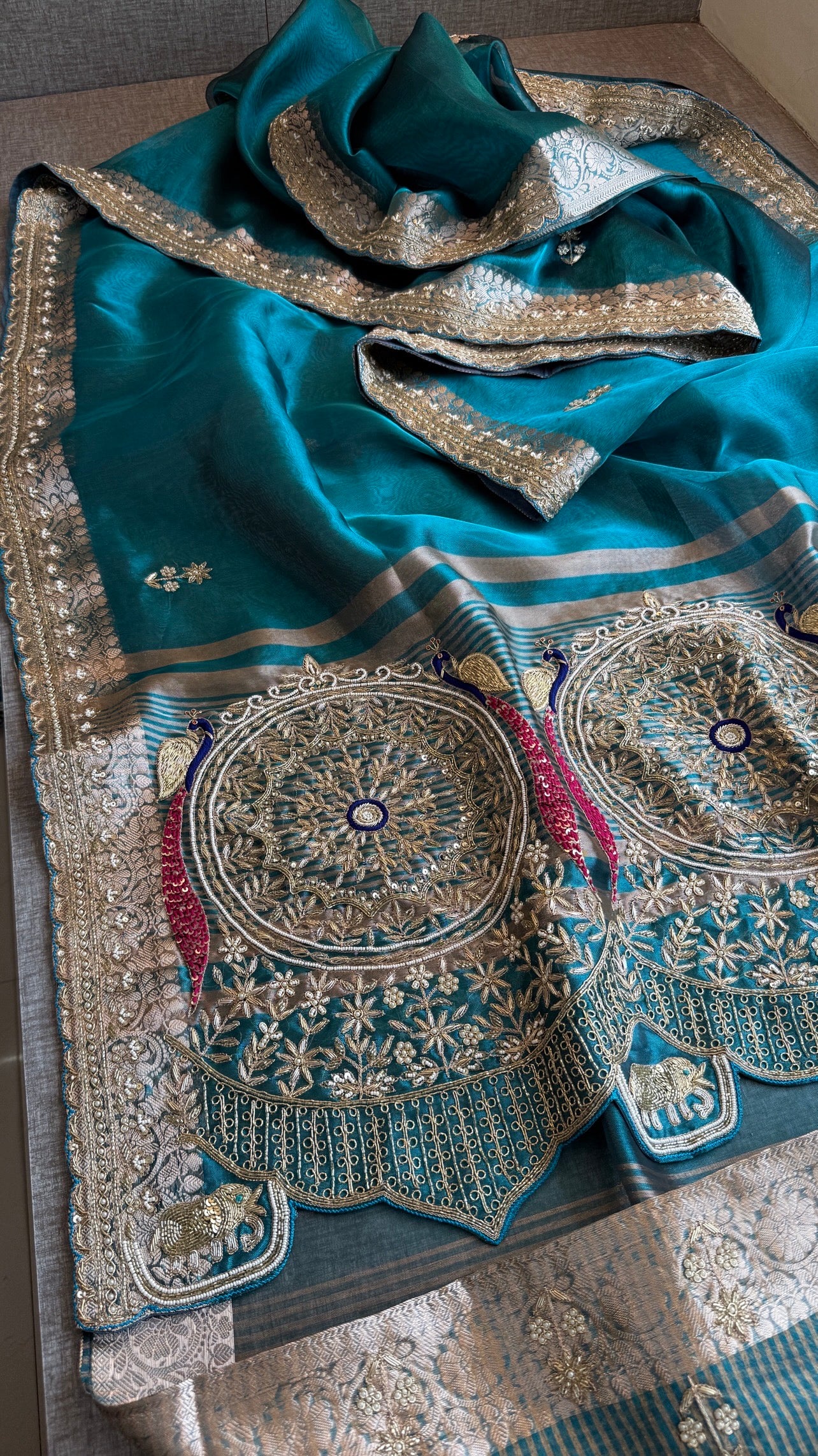 Tissue silk Saree with peacock handwork