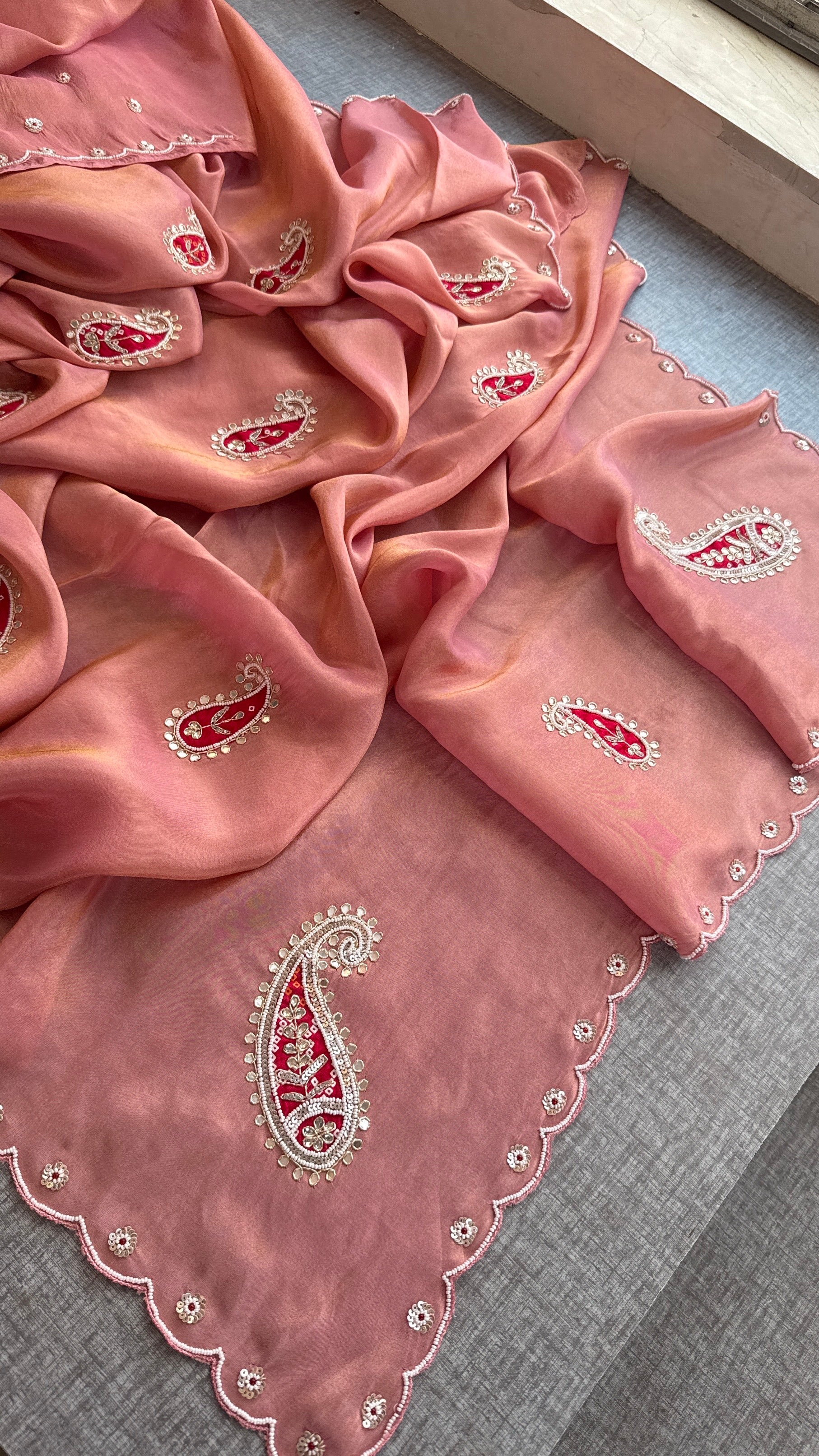 Peach-Pink Cosmo Silk Saree with Scalloped Border and Red Paisley Motifs