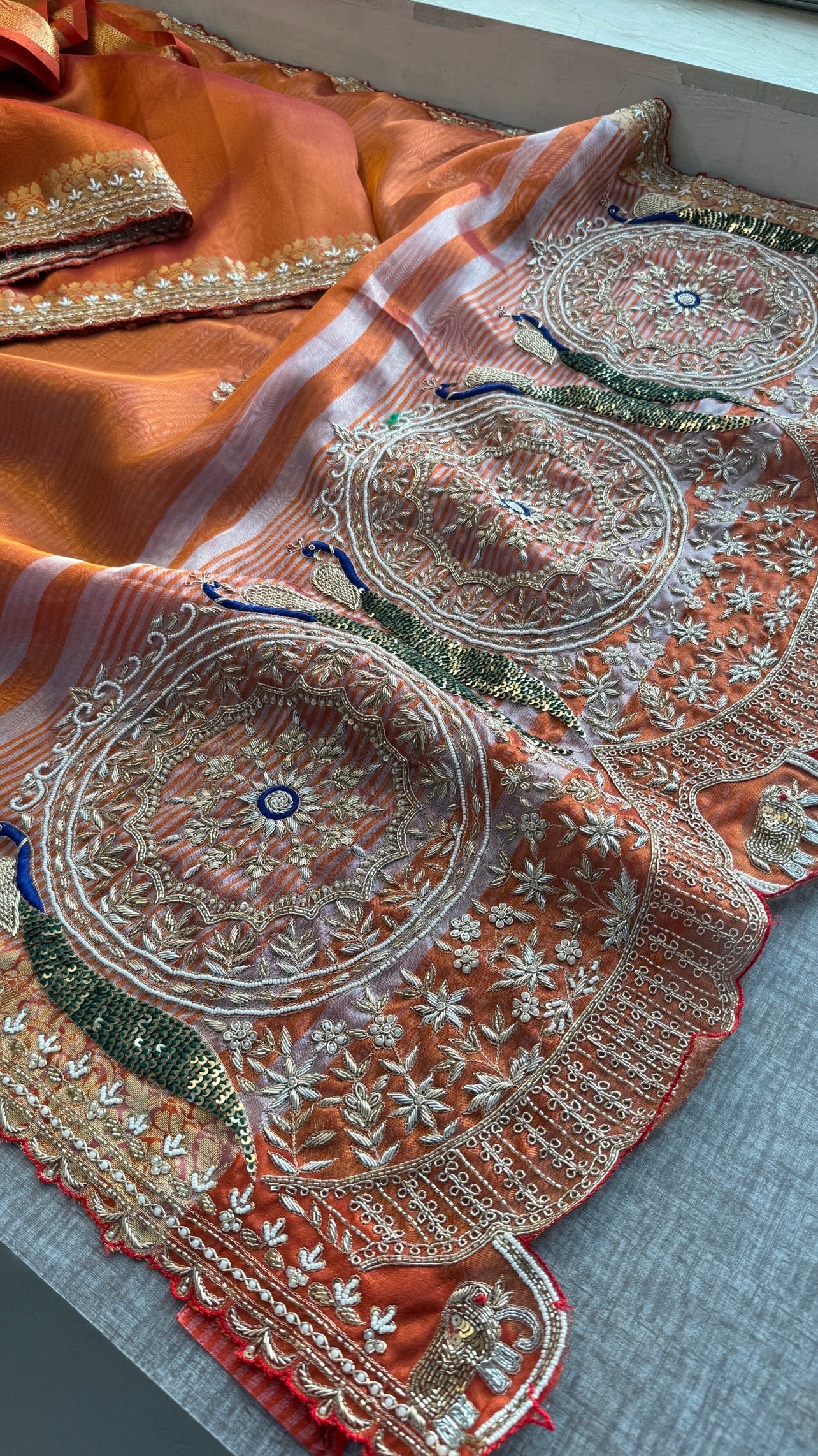 Tissue silk Saree with peacock handwork
