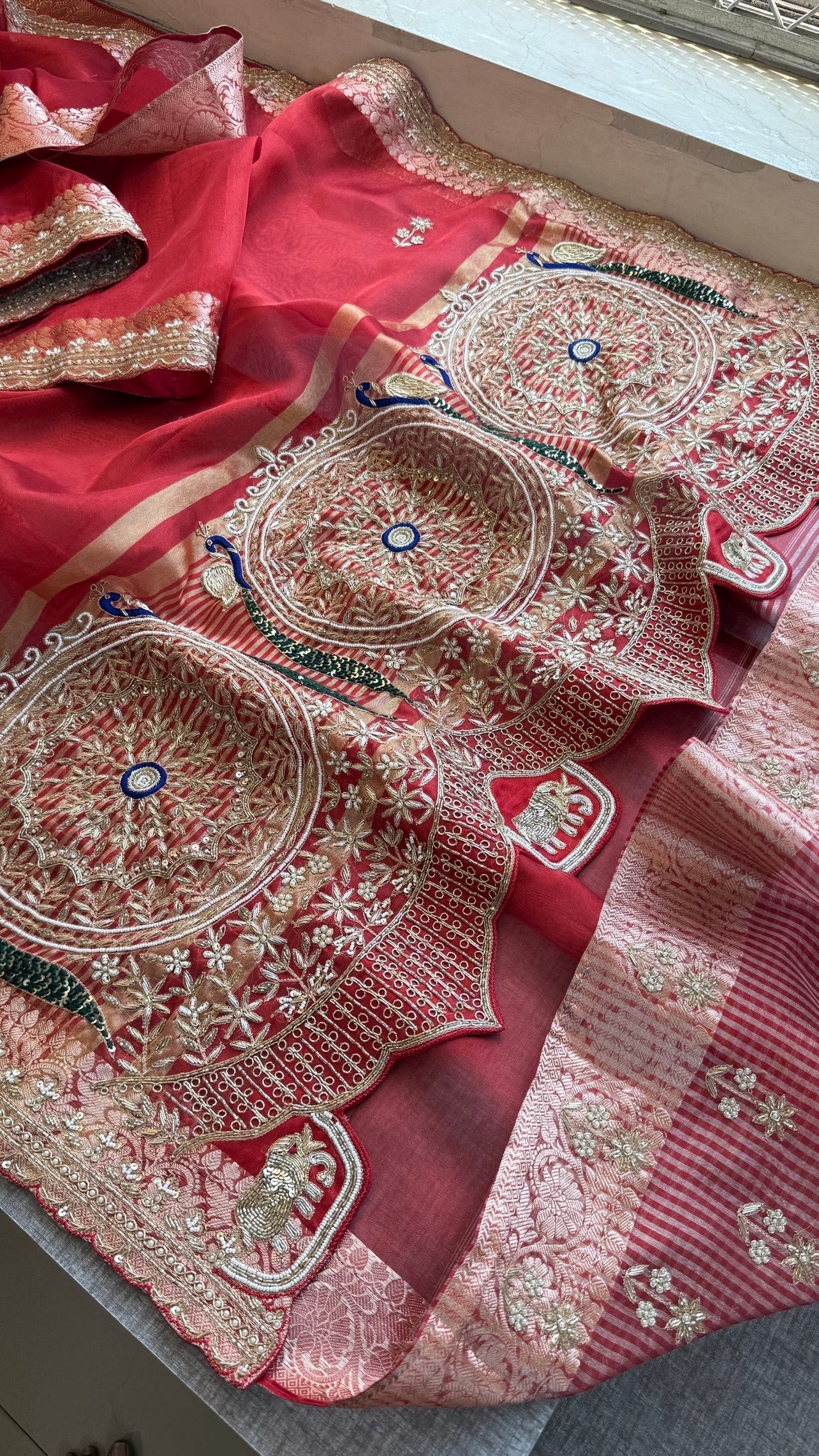 Tissue silk Saree with peacock handwork