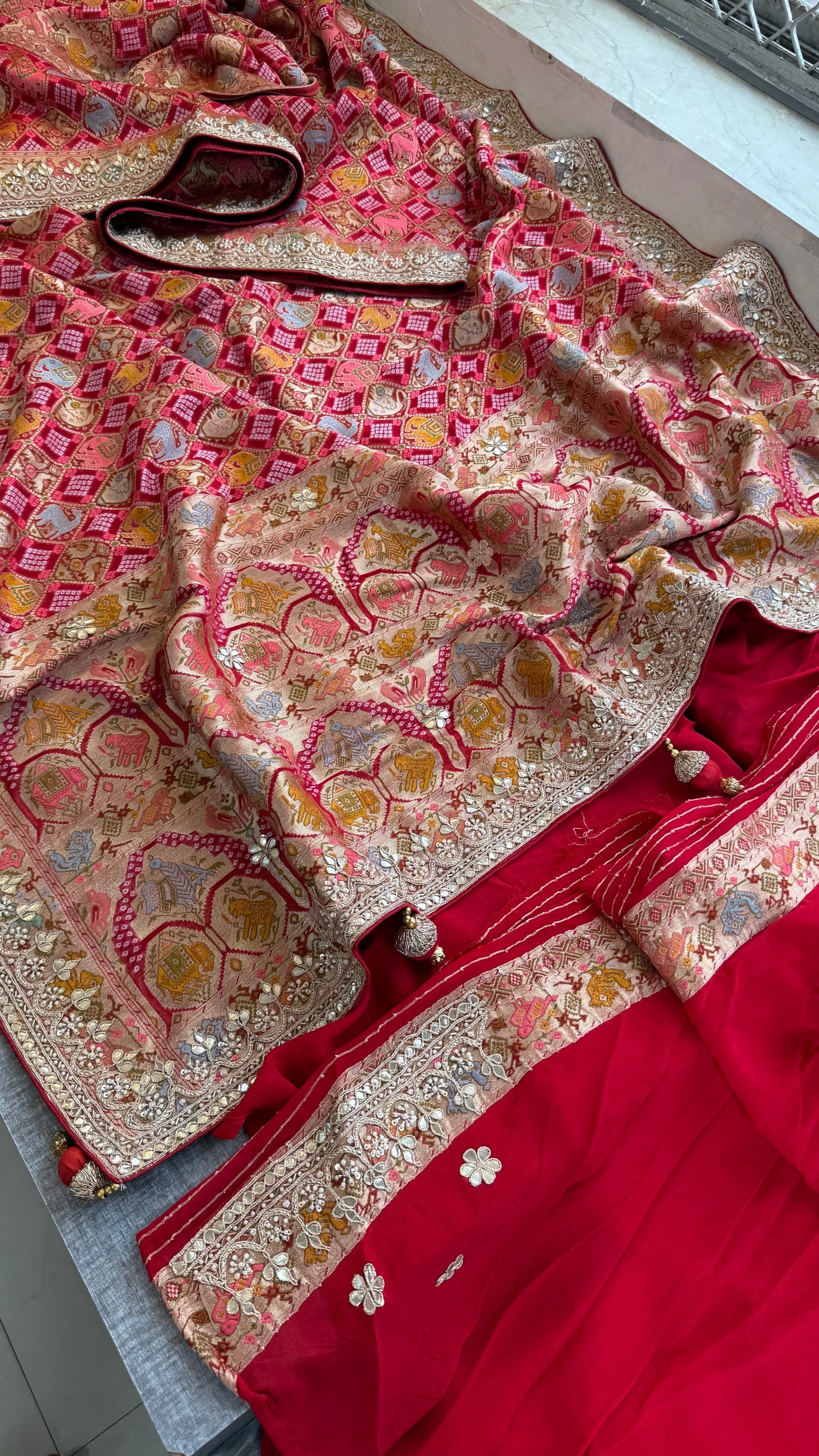 Khaddi georgette Banarasi weaving Saree with gotapatti work and tussles over pallu