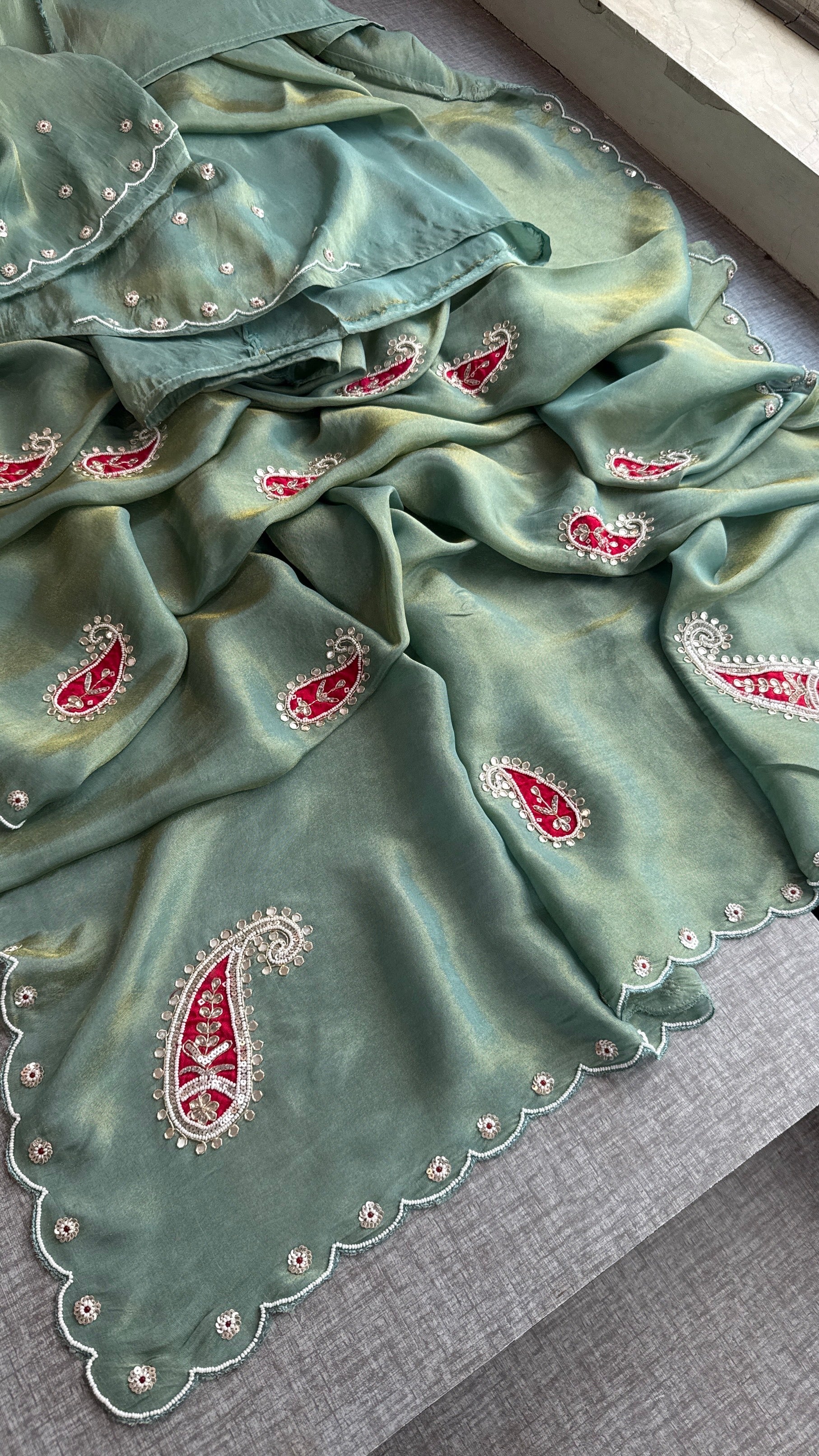 Sage Green Cosmo Silk Saree with Scalloped Border and Red Paisley Motifs
