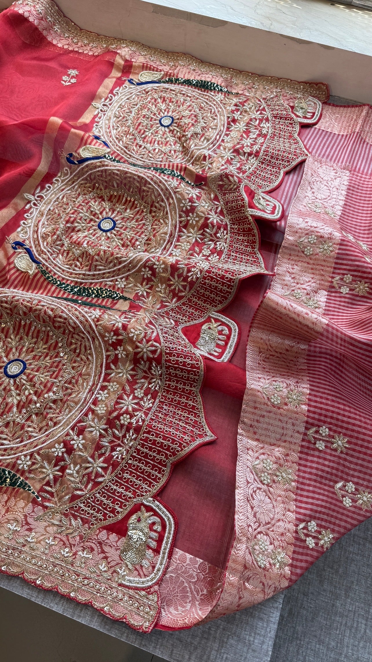 Tissue silk Saree with peacock handwork