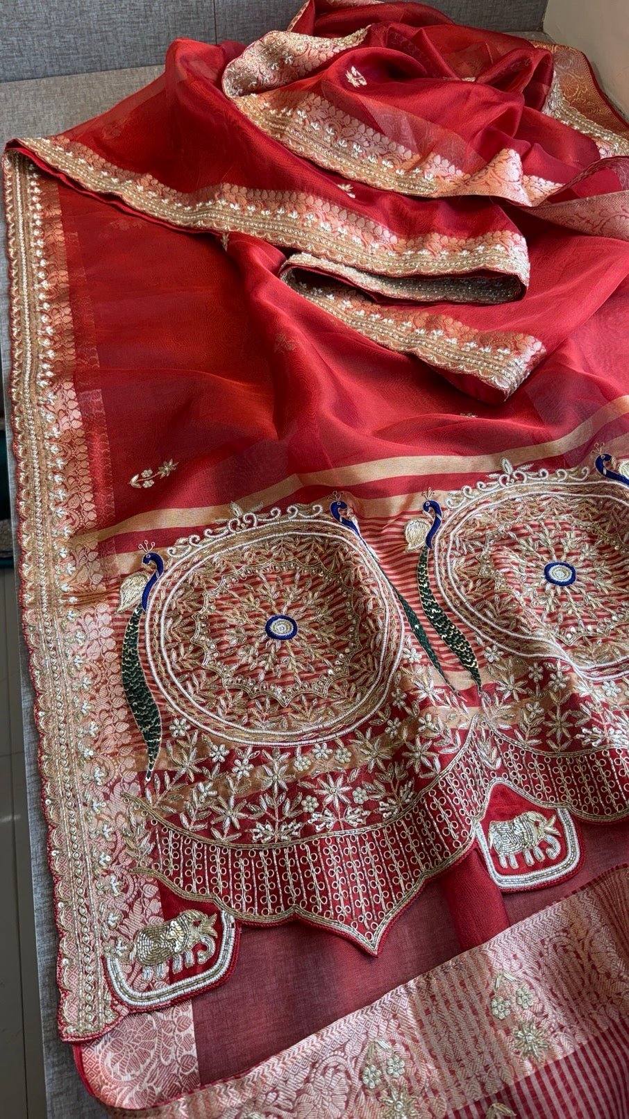 Tissue silk Saree with peacock handwork