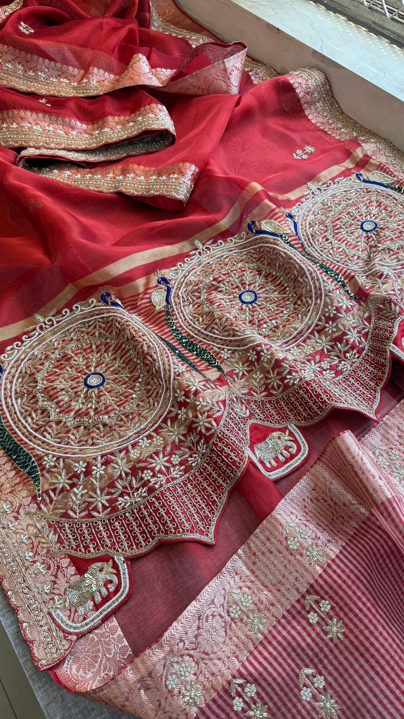 Tissue silk Saree with peacock handwork