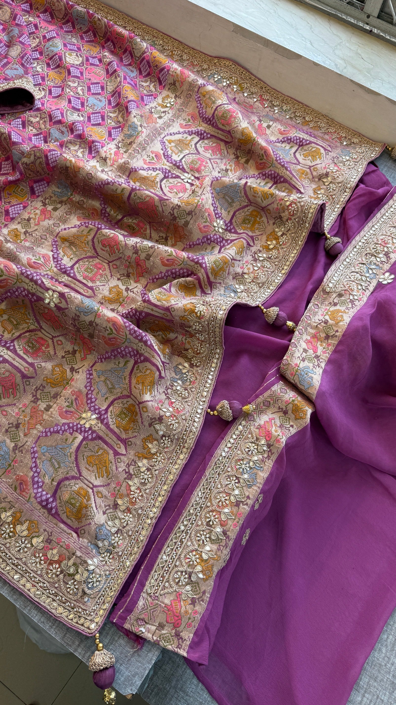 Khaddi georgette Banarasi weaving Saree with gotapatti work and tussles over pallu