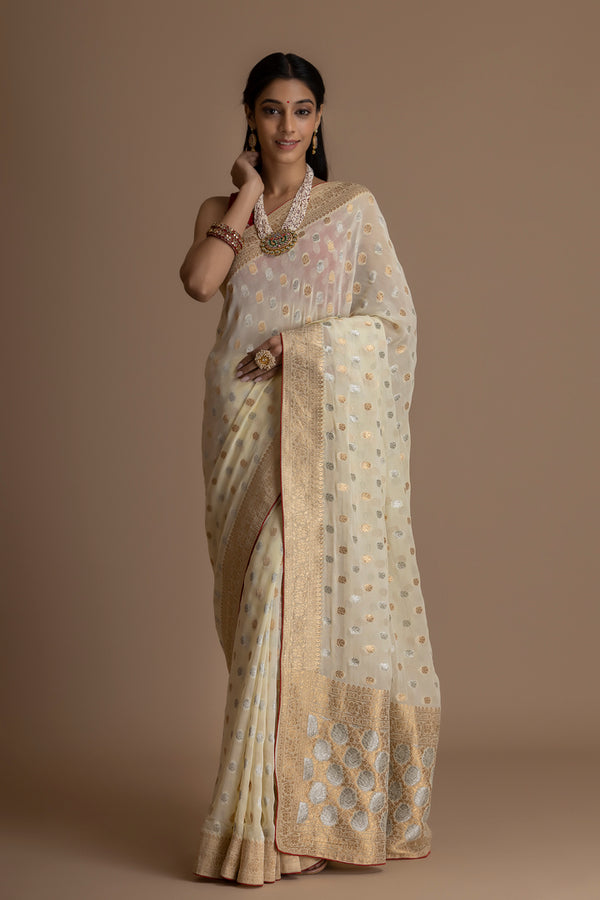 Offwhite Banarasi Pure  Khaddi Georgette Saree With Golden Silver  Zari Weaving Buttis